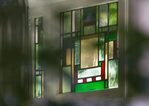 Glas in lood in een woning aan de Cornelis Trooststraat.
<br/>
Marcel Westhoff, 2016